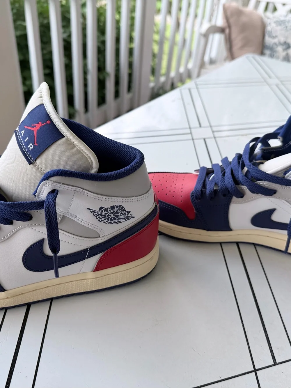 Air Jordan men’s ' High-Top Sneakers in Navy/Red/Cream